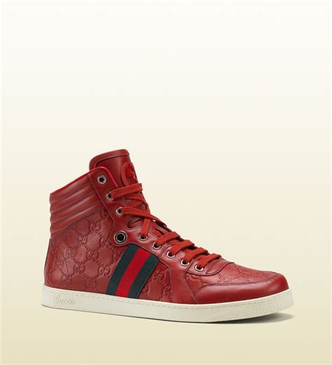 gucci sneakers red tongue|Gucci red web sneakers.